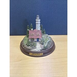 Thomas Kinkade Clearing Storms lighted light house sculpture. Tested And Works